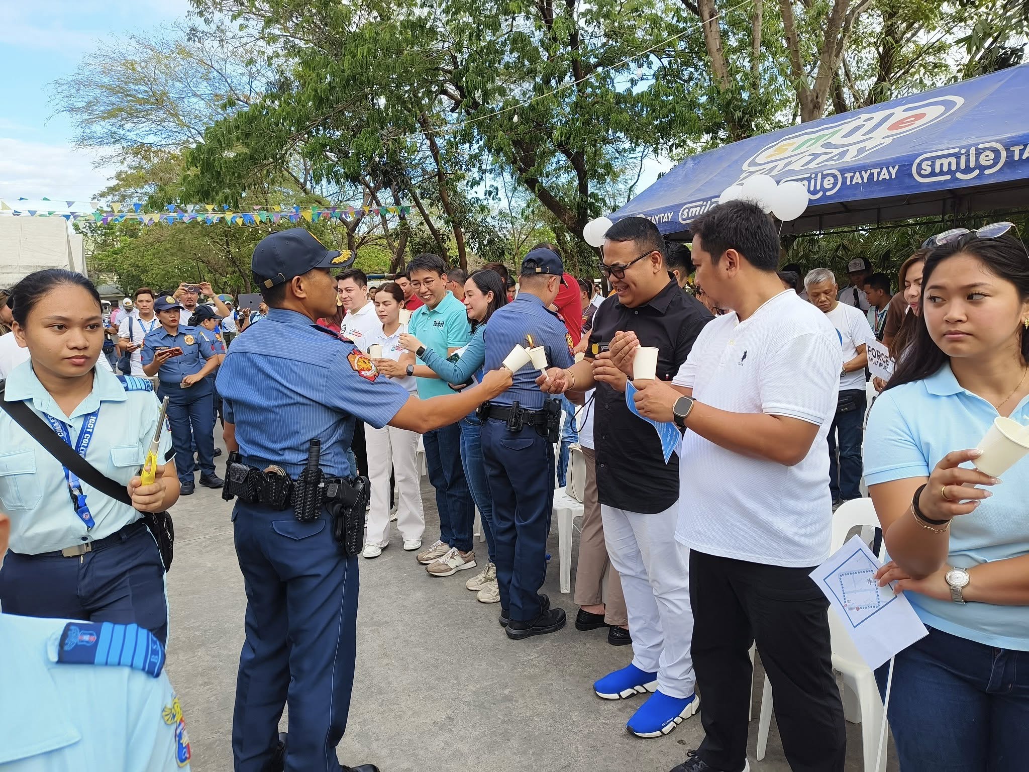 Rizal Story Peace Covenant lighting of candles.jpg