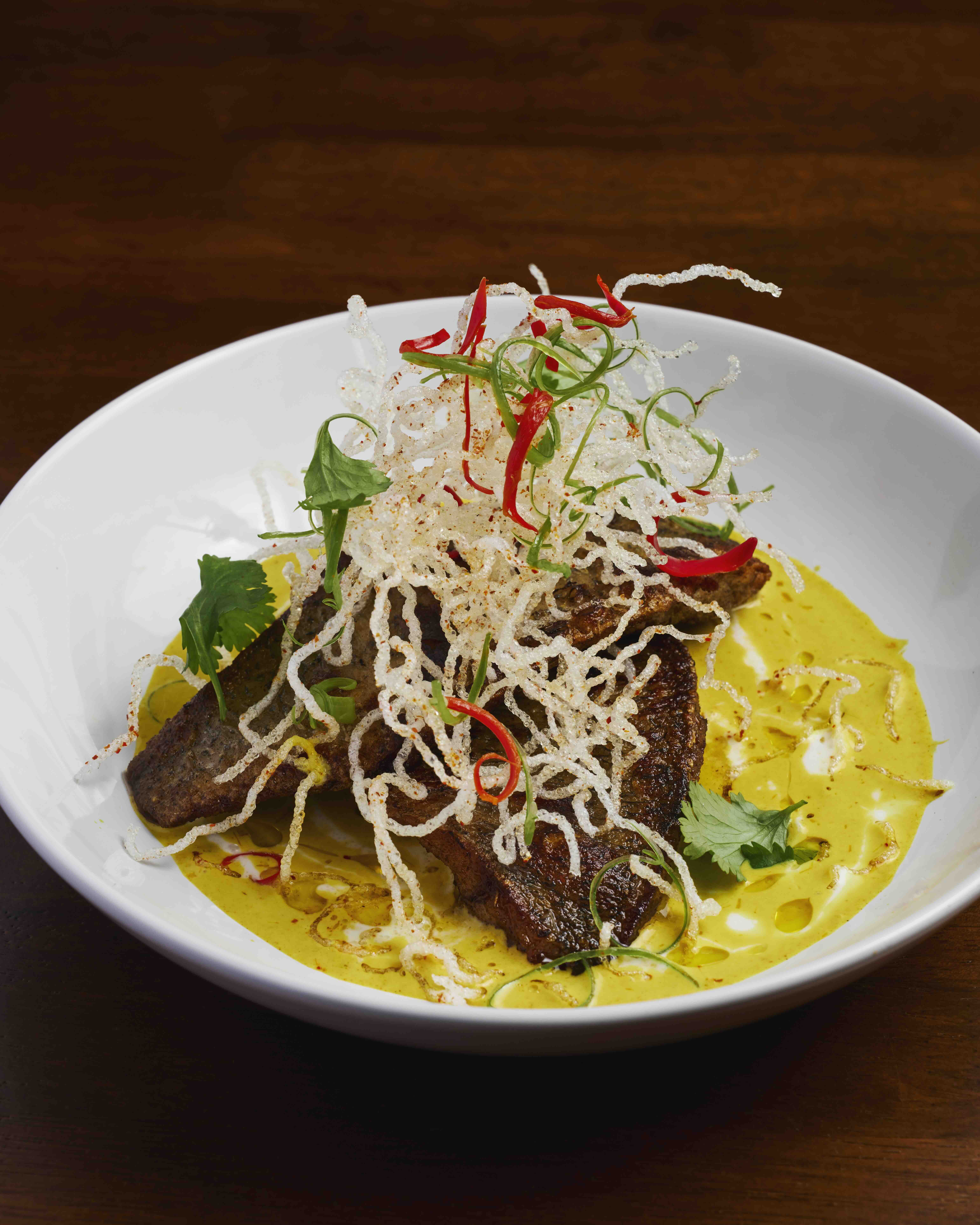 SEABASS YELLOW CURRY Served with crispy noodles.jpeg