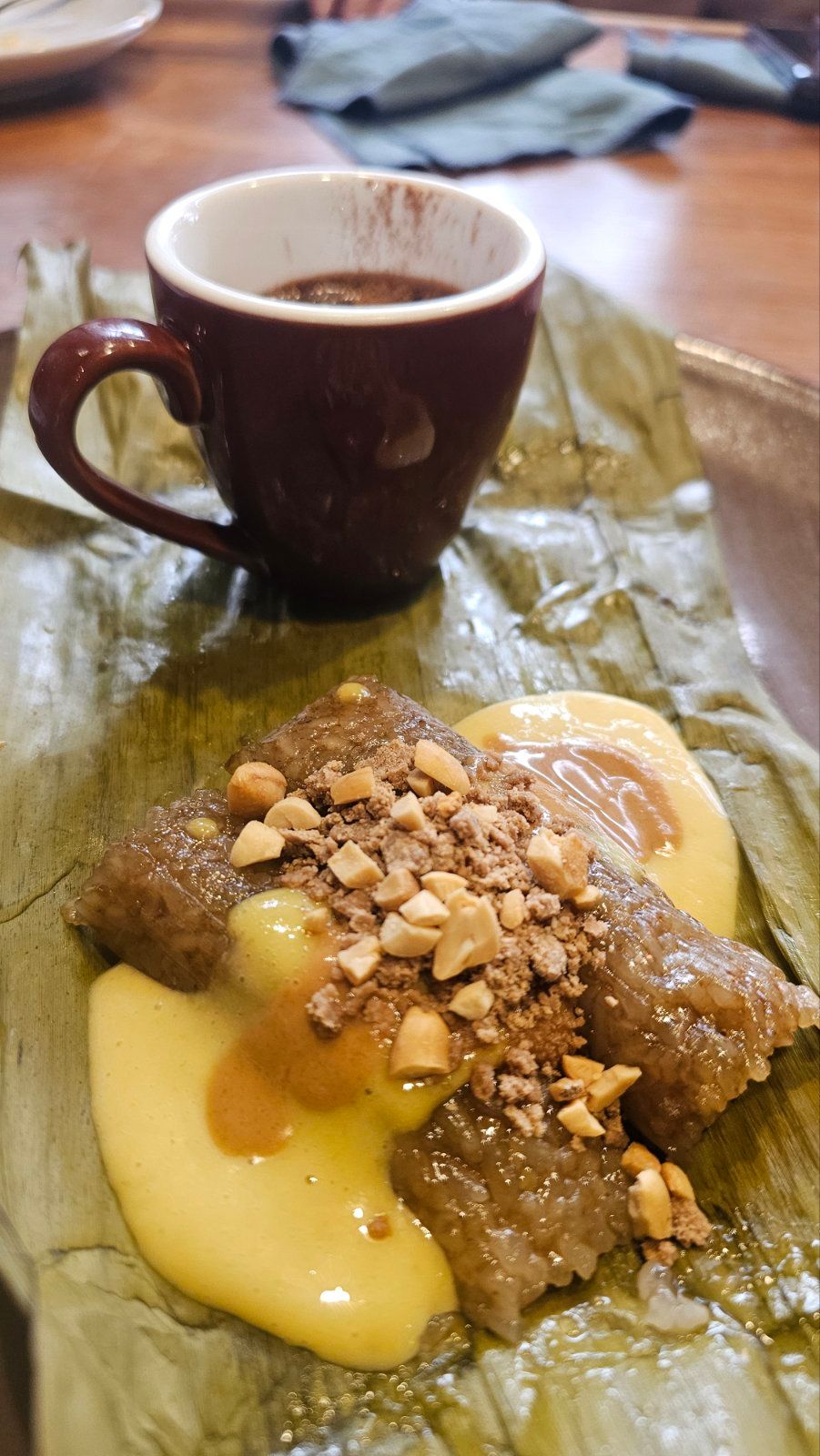 SIKWATE AND SUMAN Mango and sticky rice with milk chocolate mousse, mango butter, coconut, and peanut.jpg