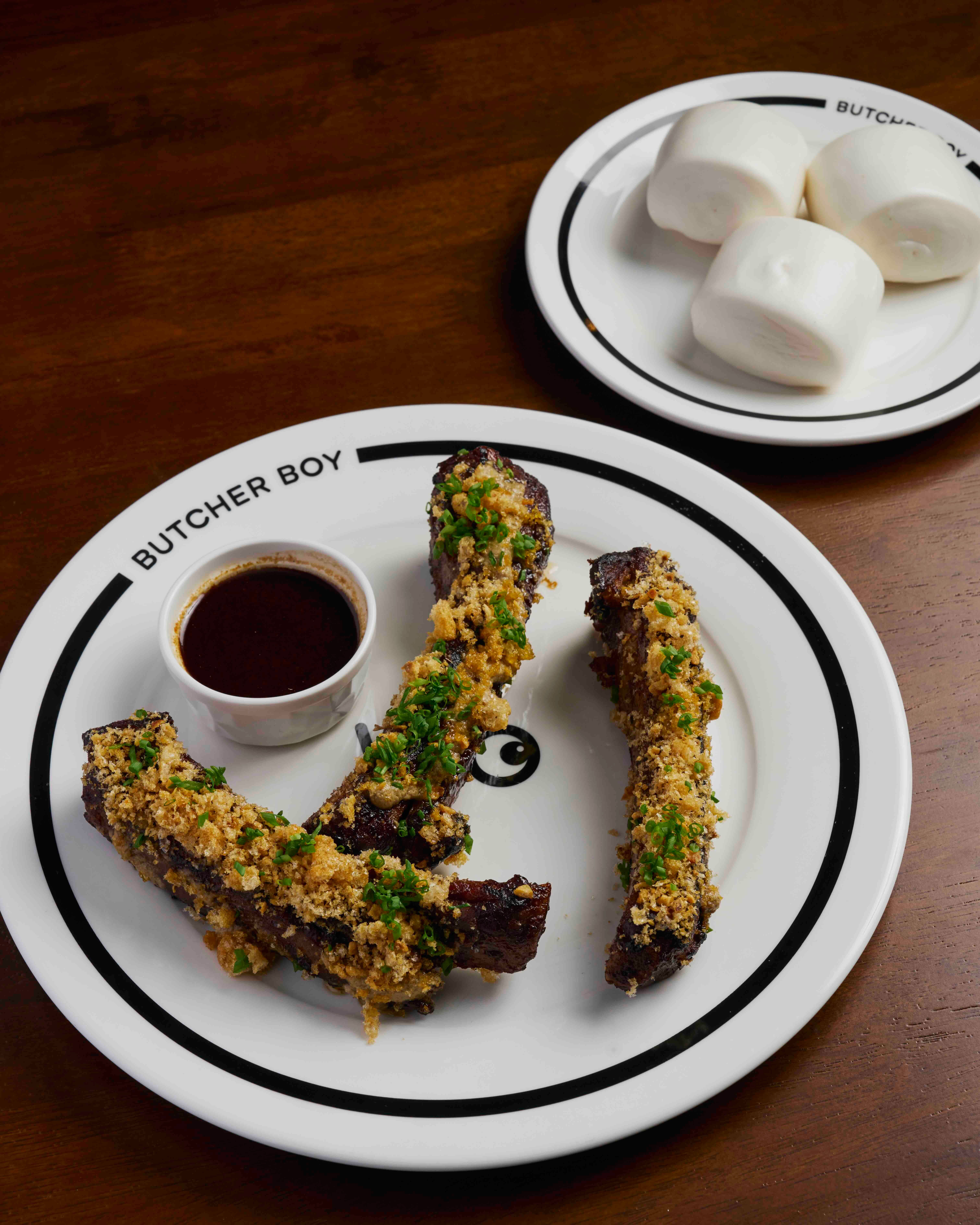 STICKY PORK RIB ADOBO BAO Served with pork adobo mantou, chicken liver parfait, and  garlic chicharrón crumbs  .jpeg