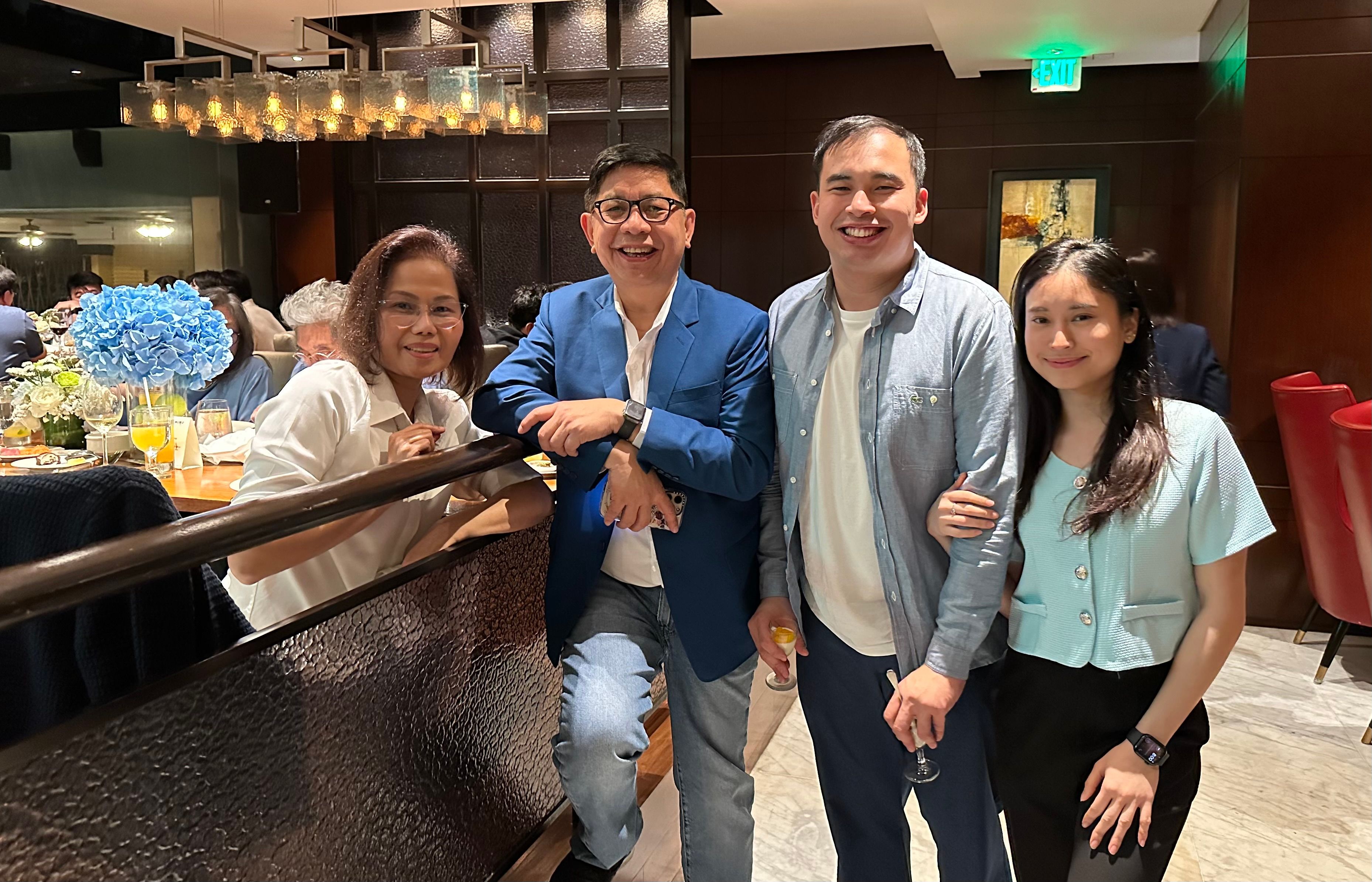 Silliman and Leah Sy with family.jpeg