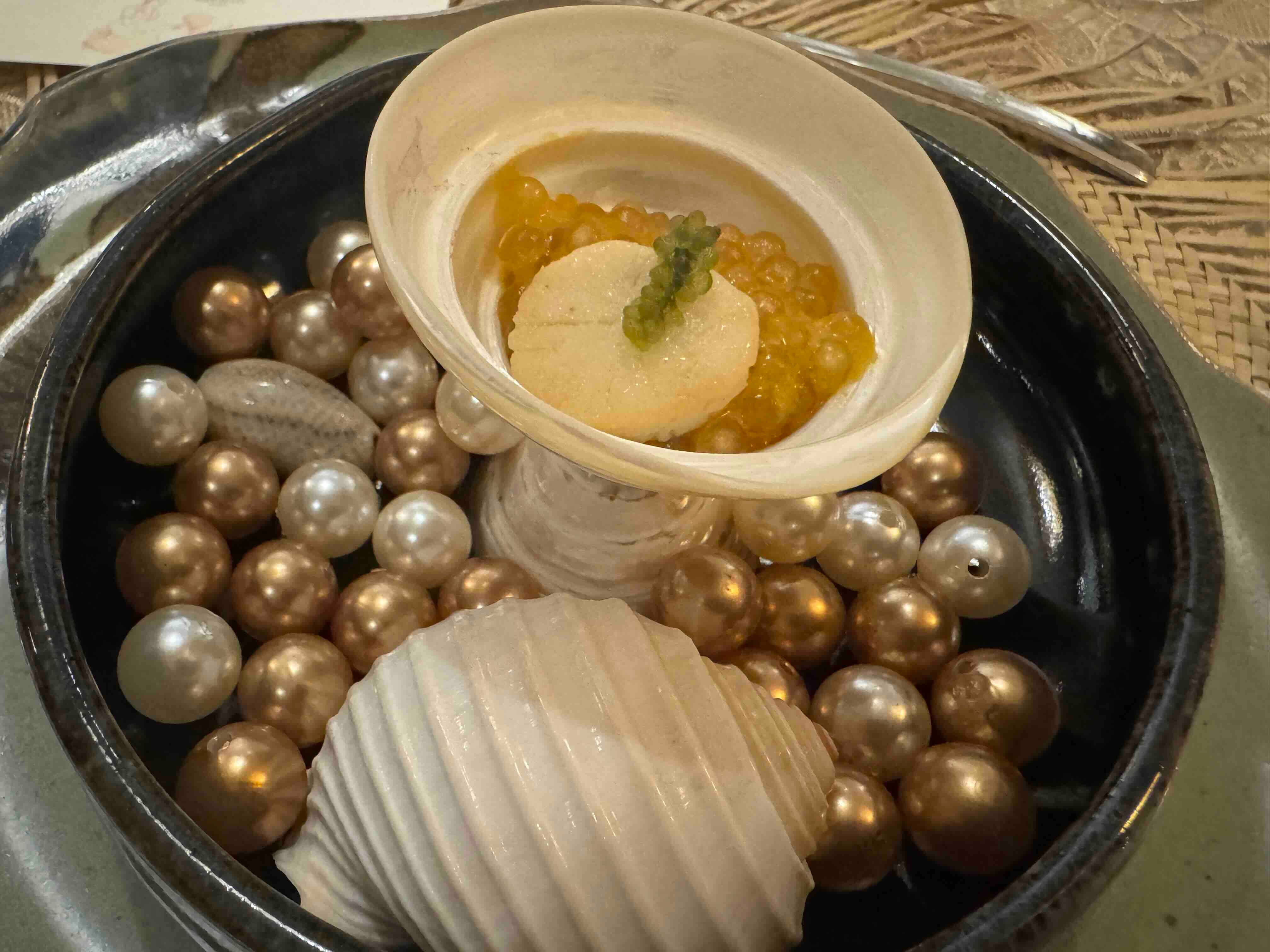 South Sea Pearls A single scallop atop glassy tapioca pearls soaked in seafood sauce.jpeg