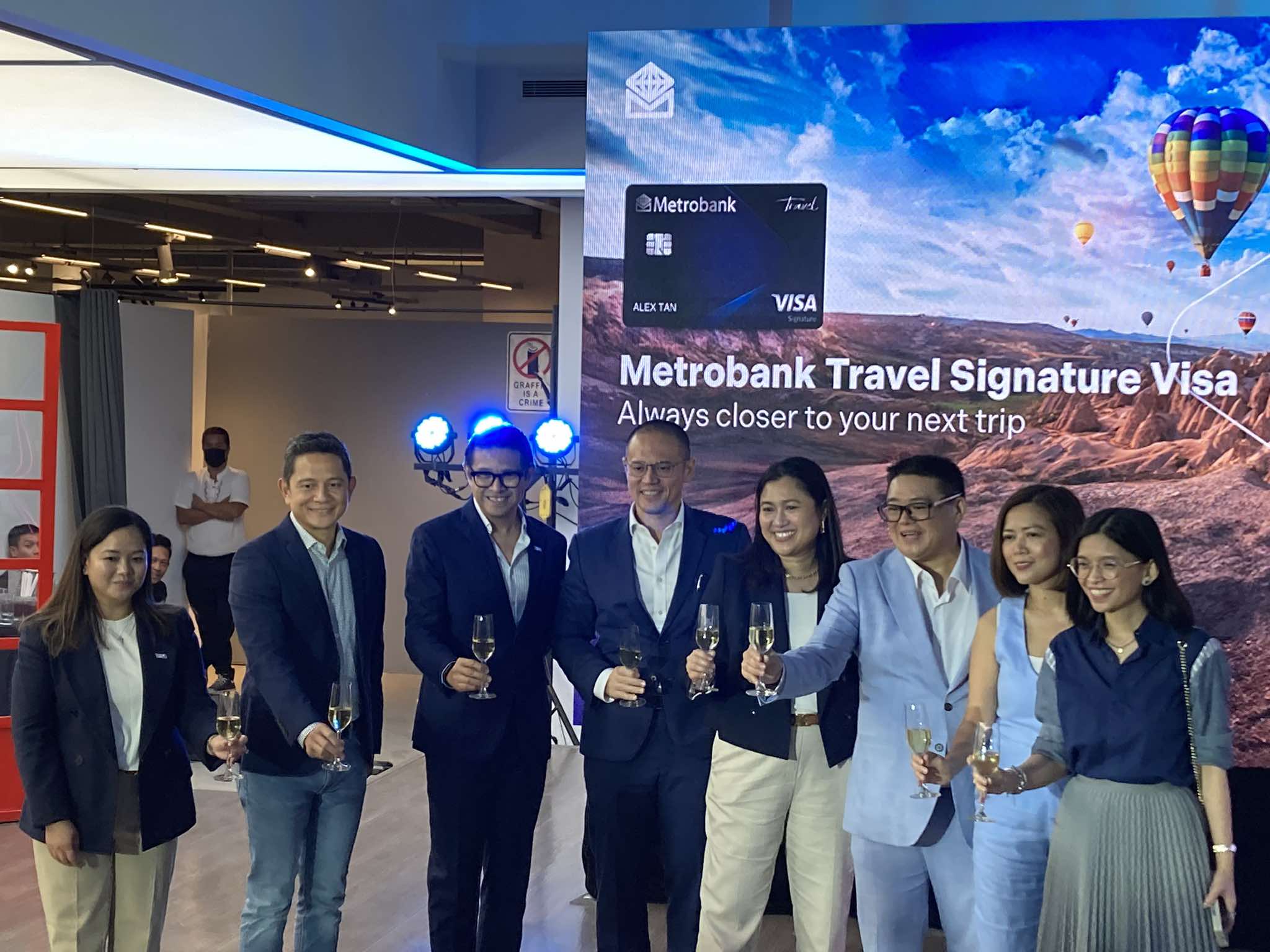 TOAST TO TRAVEL Metrobank and Visa officials toast during the official launch of the Metrobank Travel Signature card at the Metropolitan Museum in BGC.jpg