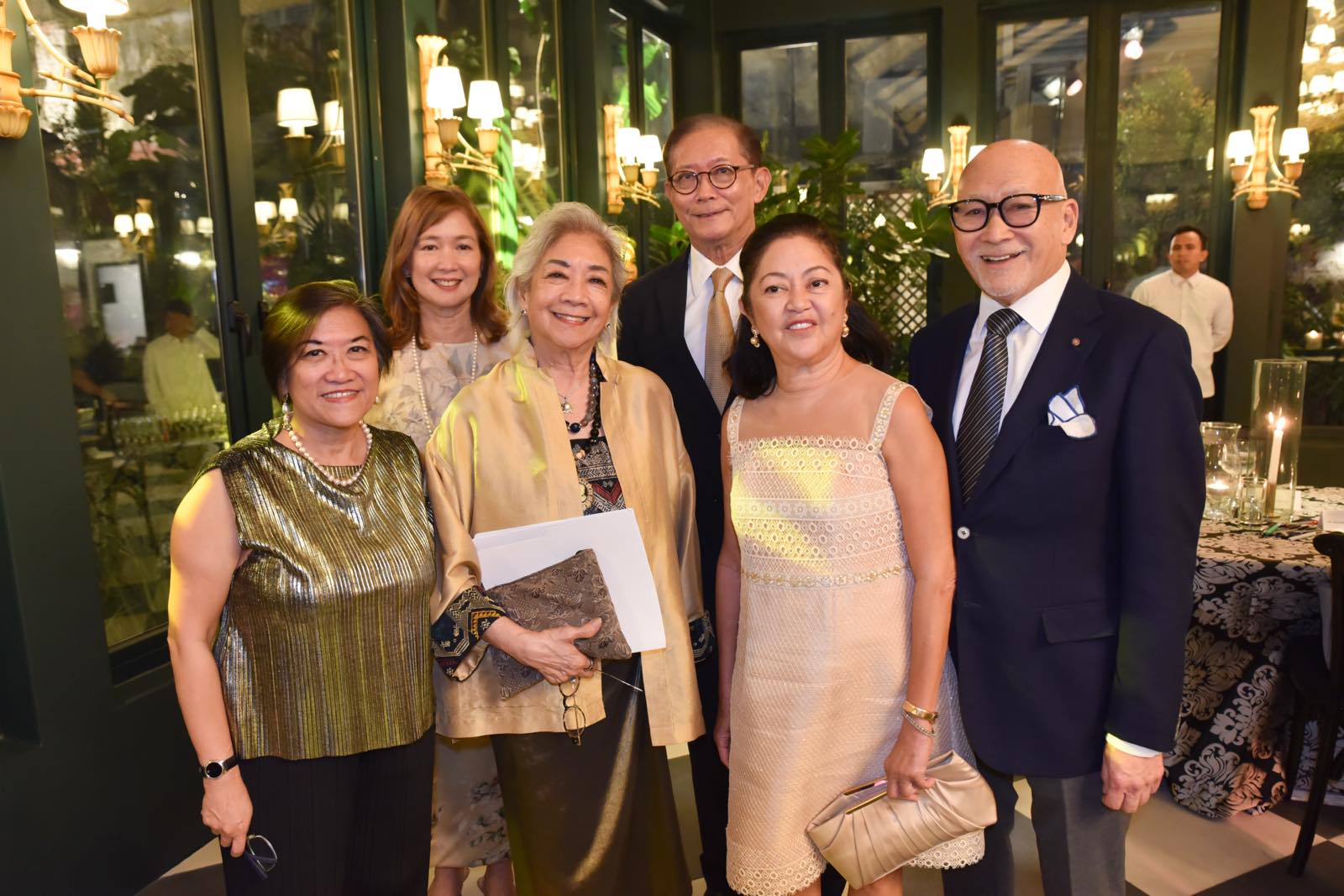 Tess Rances, Alice Reyes, First Lady Liza Araneta Marcos, and Ernest Escaler second row Patrica and Michael Escaler.jpg