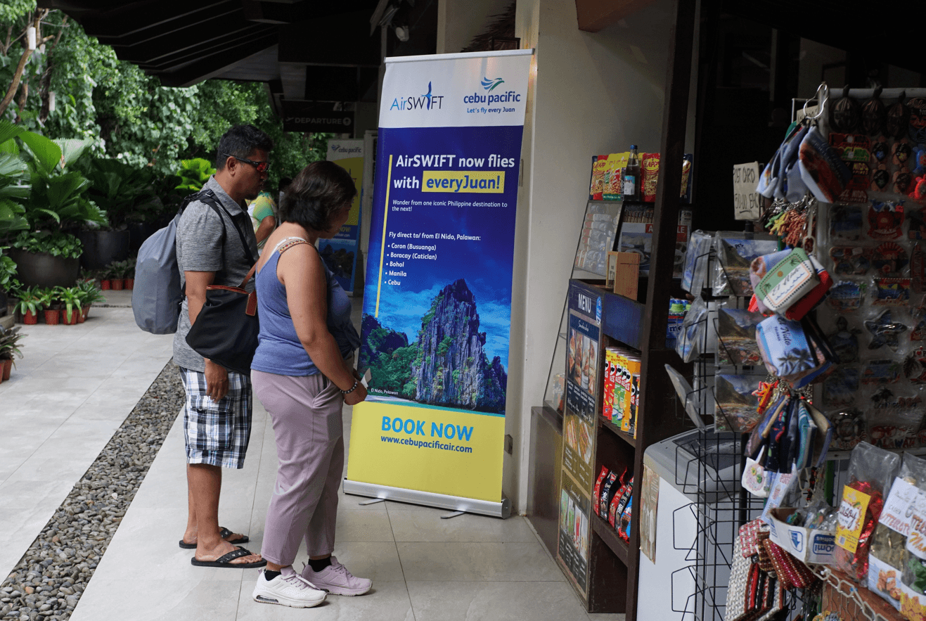 Tourists at Lio Airport.png