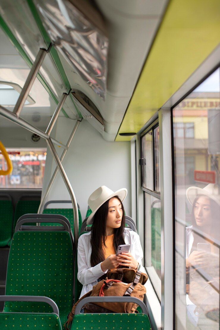 female-local-traveler-staying-bus_23-2149016671.jpg
