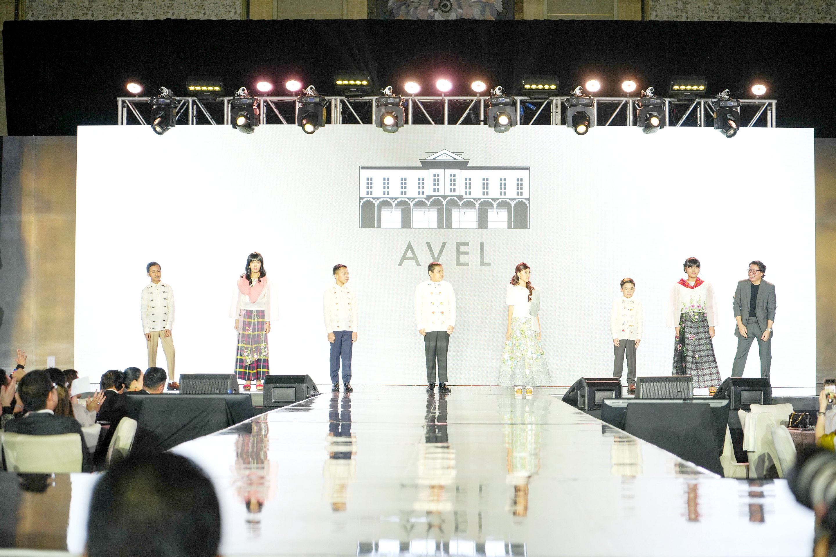 Avel Bacudio and his models.jpg