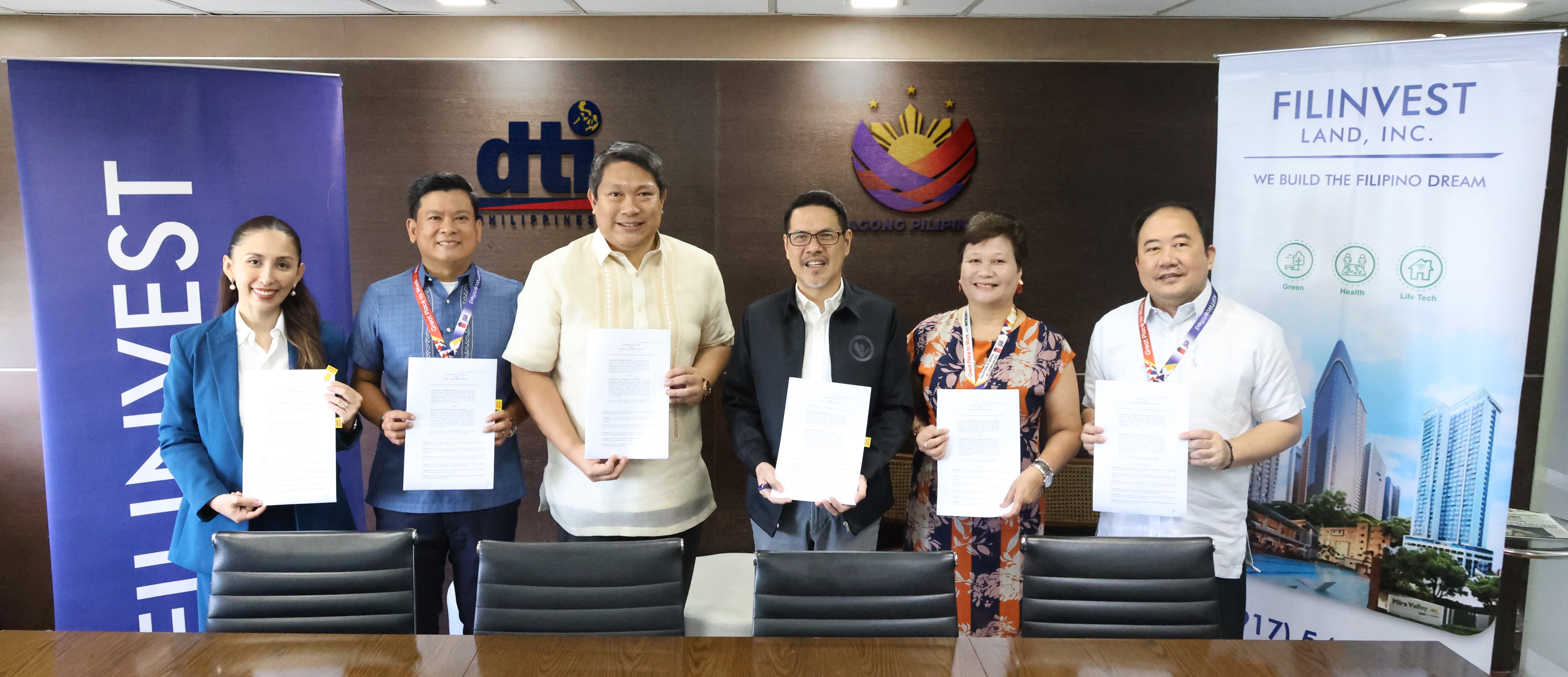 FLI x DTI Contract Signing Photo 1 copy.jpg