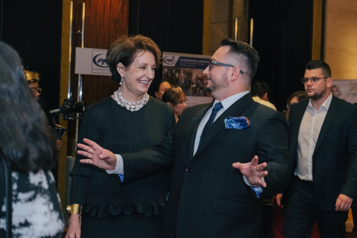 MaryKay L. Carlson and Spouse of Ambassador Titanilla Toth.png