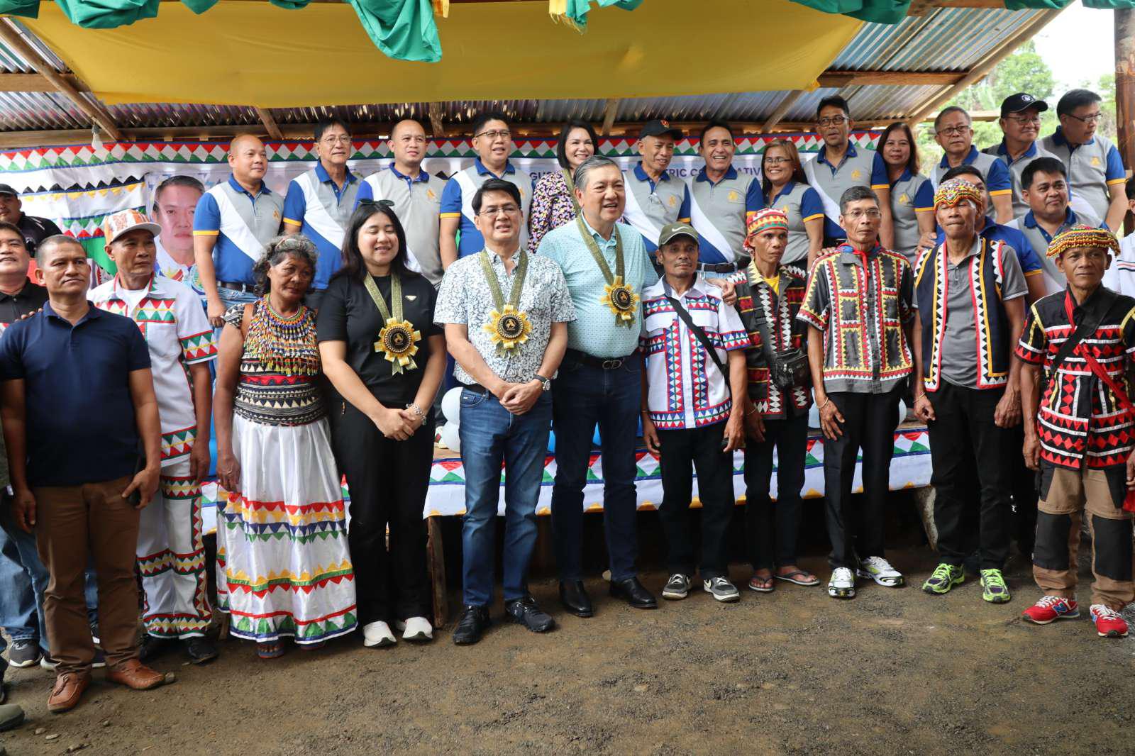 NEA Administrator Antonio Almeda with LGU offcials and Higaonon tribal leaders.jpg