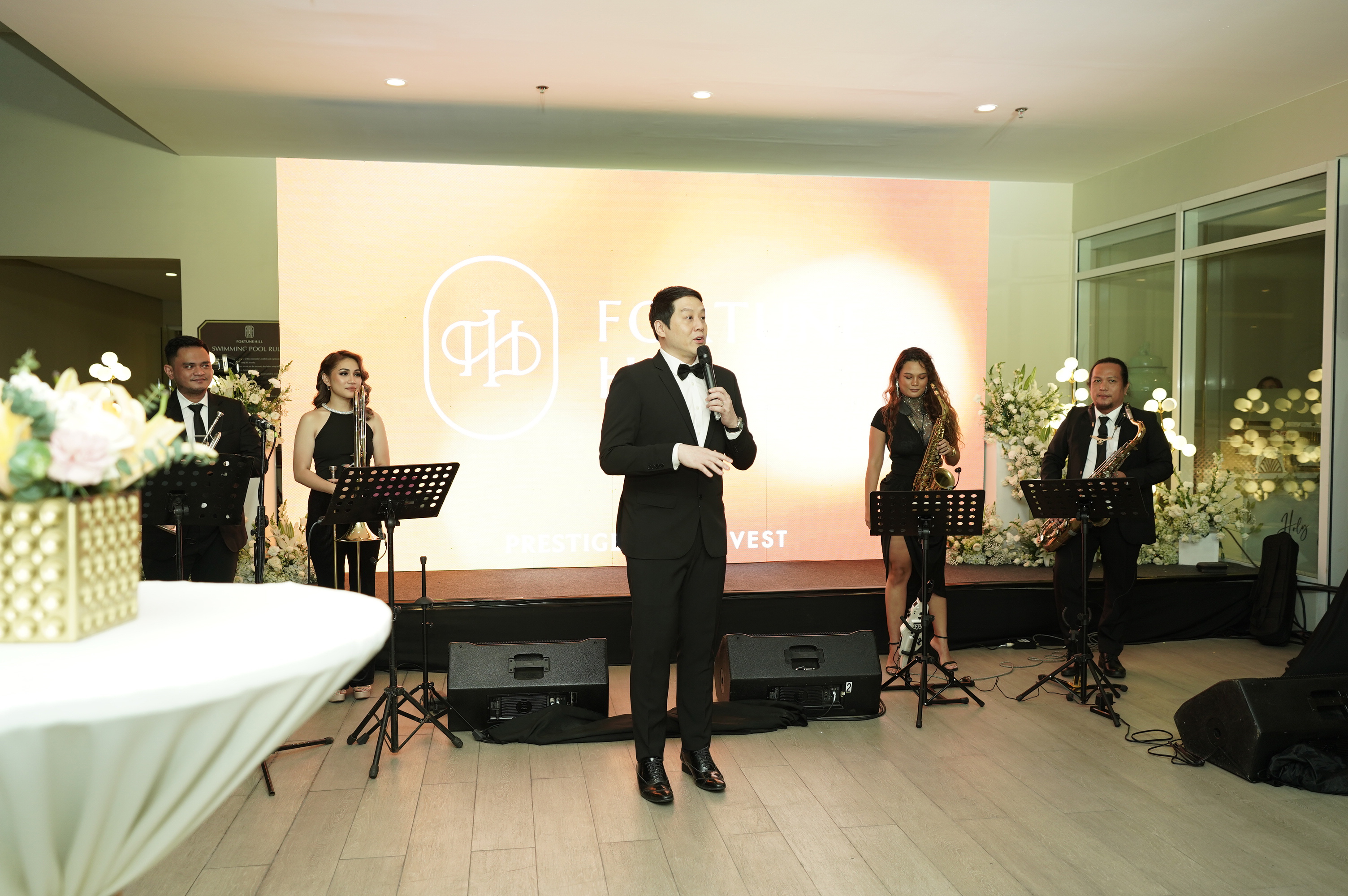 Richard Poon serenading the guests during the intimate launch event (1).jpg