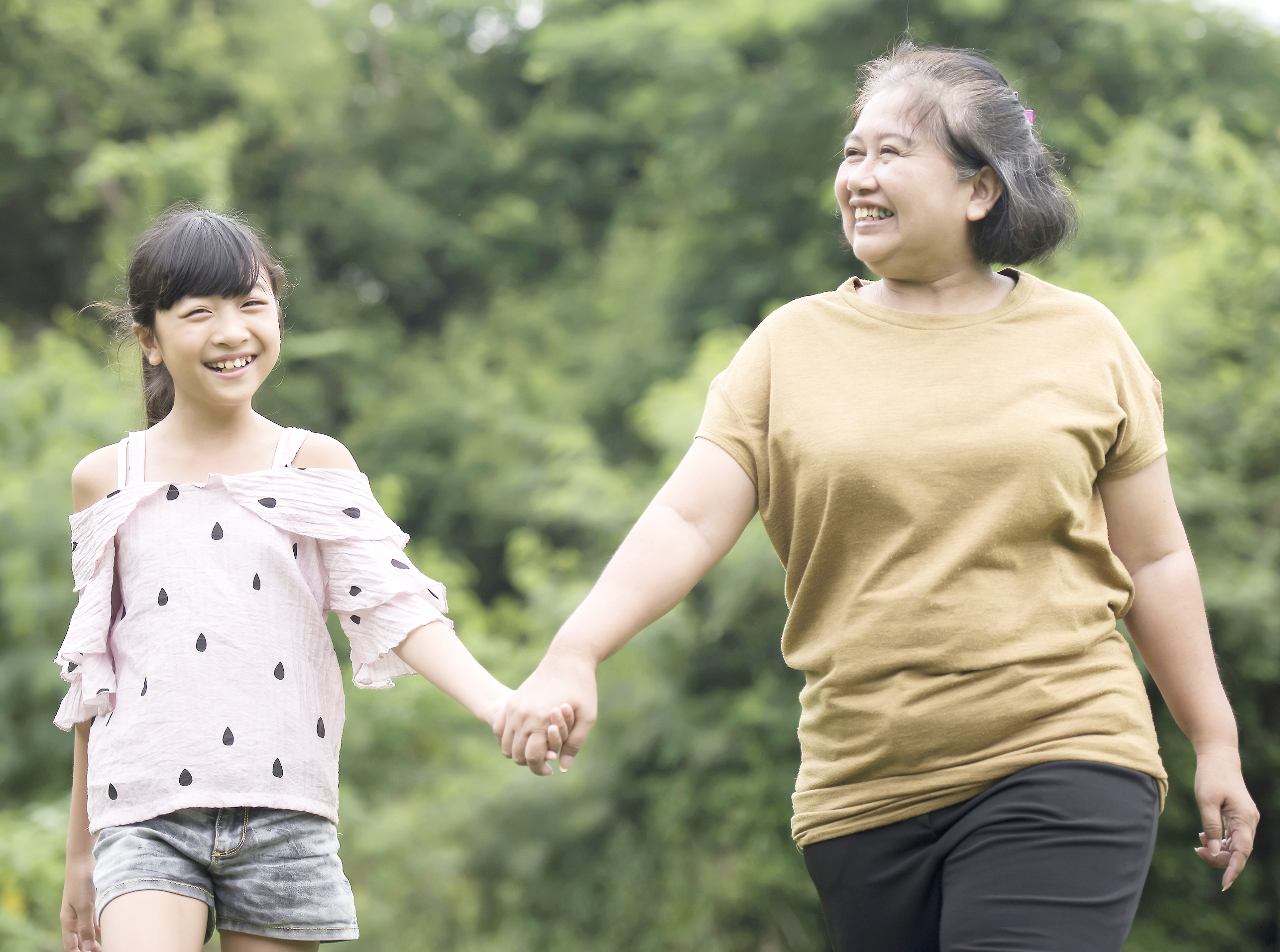 grandmother-playing-with-granddaughter-outdoors-park.jpg