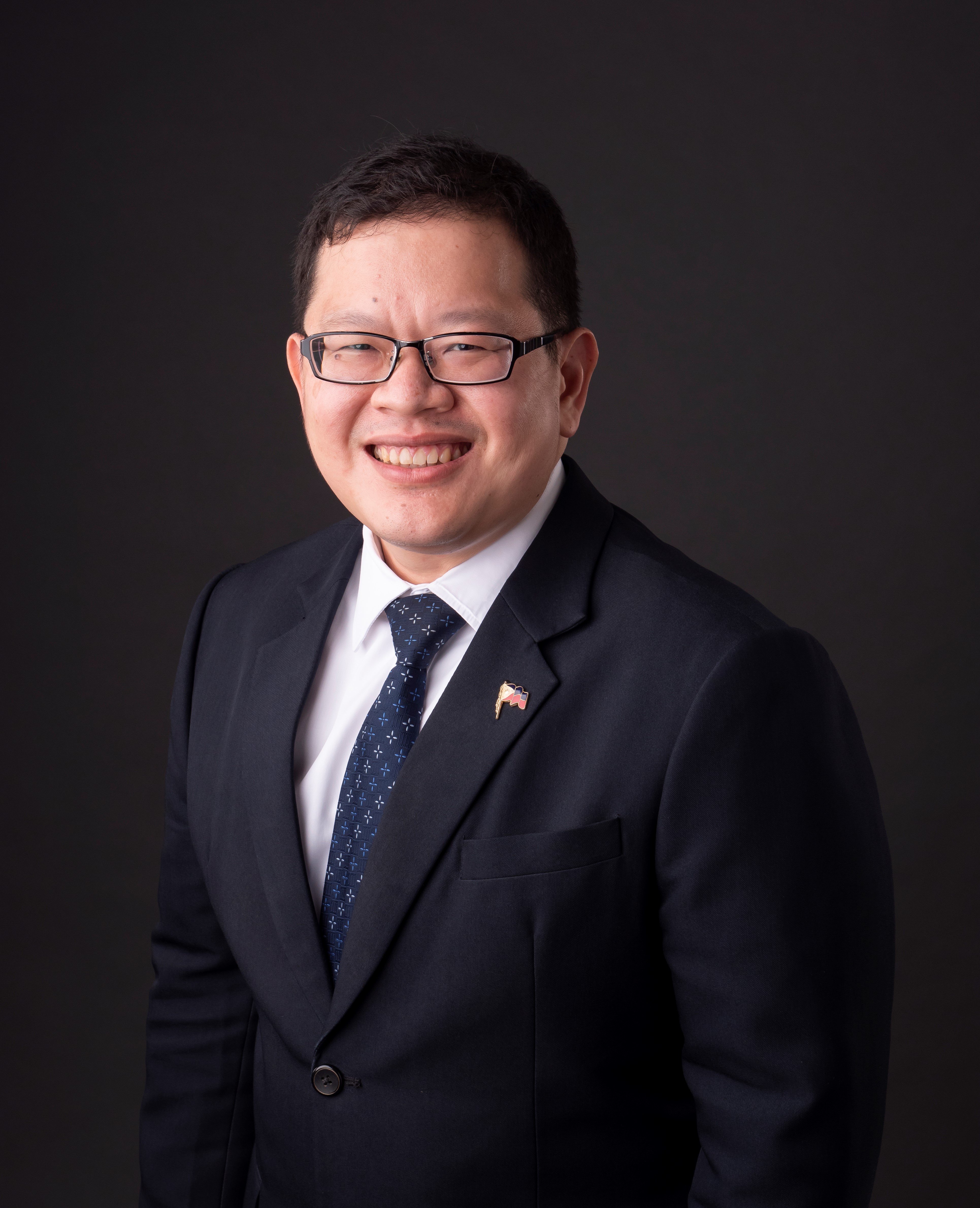 SEC Commissioner Kelvin Lee Official Photo.jpg